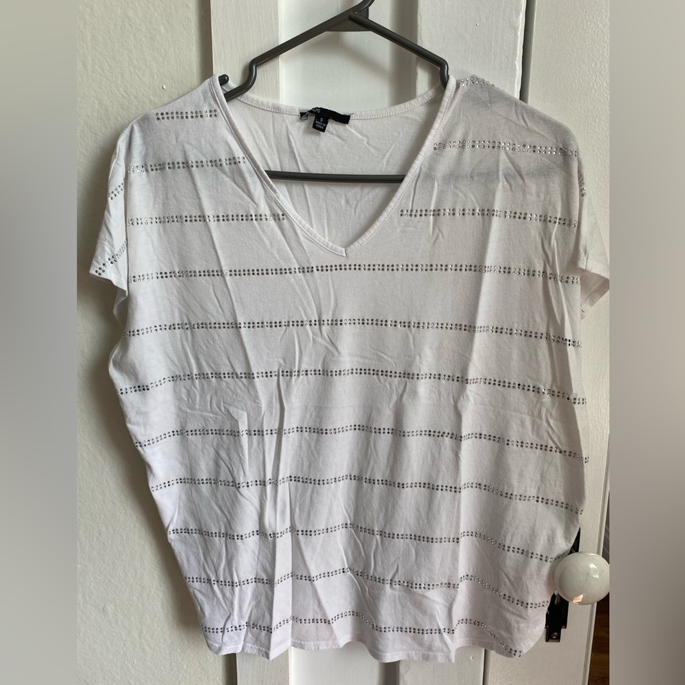 White shirt sleeve t-shirt with sequin dots. Barely worn, but few dots missing.